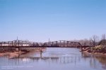 MP SD40-2s 3262-3042-3176, are crossing Red River, at Fulton, Arkansas. March 8, 1984.